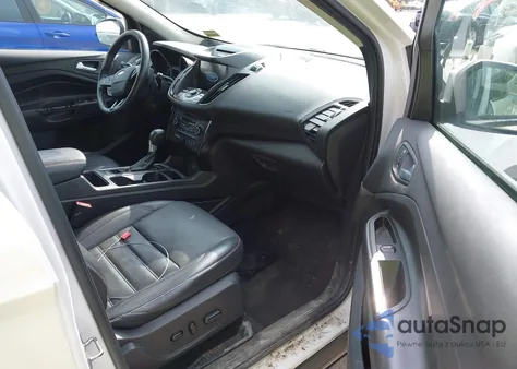 2017 Ford Escape Titanium z USA, uszkodzony, nr VIN 1FMCU9J92HUA73499